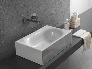 lavabo sobre encimera / rectangular / de cerámica / moderno