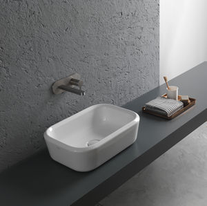 lavabo sobre encimera / rectangular / de cerámica / moderno