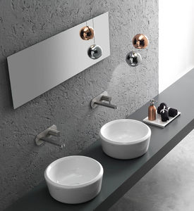 lavabo sobre encimera / redondo / de cerámica / moderno