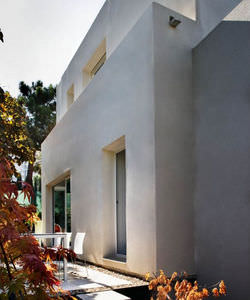 casa individual / moderna / de hormigón / de 2 plantas