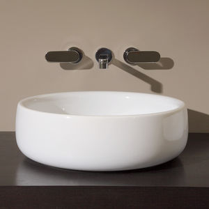 lavabo sobre encimera / redondo / de cerámica / moderno