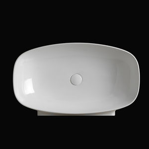 lavabo sobre encimera / ovalado / de cerámica / moderno