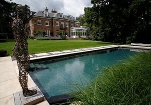 piscina enterrada / de hormigón / biológica / de exterior