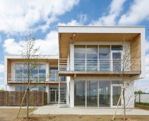 edificio prefabricado / para oficina / de madera / con armazón de madera