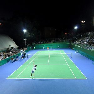 pavimento sintético / para pista de tenis / en rollo / aspecto hormigón