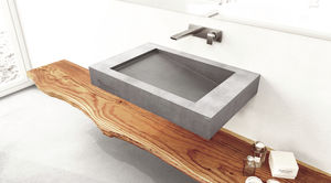 lavabo suspendido / rectangular / de hormigón / moderno