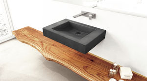 lavabo suspendido / rectangular / de hormigón / moderno