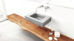 lavabo suspendido / rectangular / de hormigón / moderno