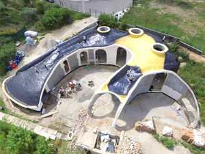 casa individual / de diseño original / de hormigón / ecológica