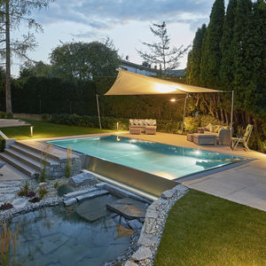 piscina enterrada / de acero inoxidable / autoportante / infinita