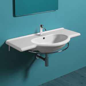 lavabo suspendido / de cerámica / moderno / con encimera