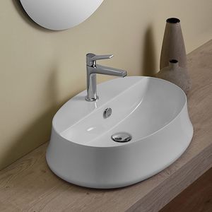 lavabo sobre encimera / ovalado / de cerámica / moderno
