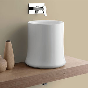 lavabo sobre encimera / redondo / de cerámica / moderno