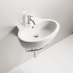 lavabo suspendido / ovalado / de cerámica / moderno
