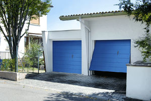 puertas de garaje basculantes / de acero / automáticas