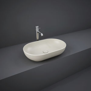 lavabo suspendido / ovalado / de cerámica / moderno