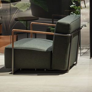 sillón moderno / de tejido / de cuero / de metal