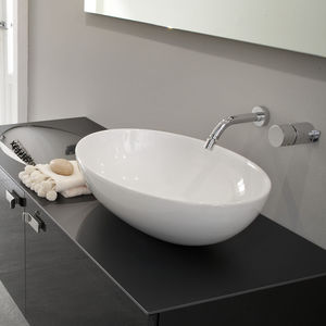 lavabo sobre encimera / ovalado / de cerámica / moderno