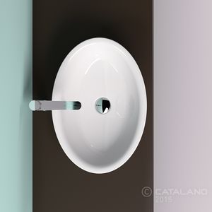 lavabo sobre encimera / ovalado / de cerámica / moderno