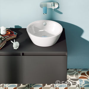 lavabo sobre encimera / redondo / de cerámica / moderno