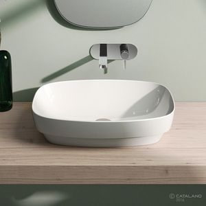 lavabo sobre encimera / ovalado / de cerámica / moderno