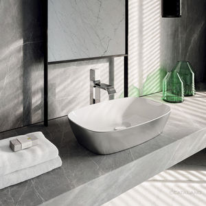 lavabo sobre encimera / rectangular / de cerámica / moderno