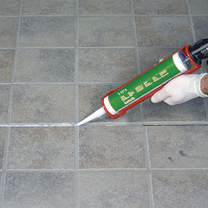 mastique elástico / a base de resina de silicona / de fijación / resistente a los UV
