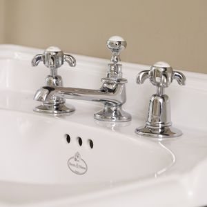 grifo mezclador para lavabo / de libre instalación / de metal cromado / de latón