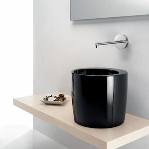 lavabo sobre encimera / redondo / de cerámica / de diseño original