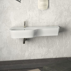 lavabo suspendido / de cerámica / moderno / con encimera