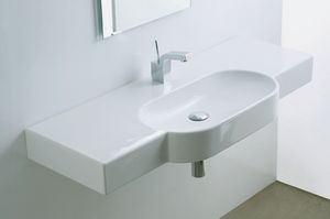 lavabo suspendido / de cerámica / moderno / con encimera