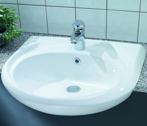 lavabo semiencastrado / ovalado / de cerámica / moderno
