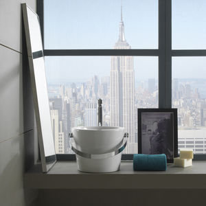 lavabo sobre encimera / redondo / de cerámica / moderno