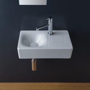 lavabo suspendido / rectangular / de cerámica / moderno