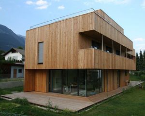 casa individual / prefabricada / moderna / con armazón de madera