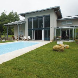 casa individual / prefabricada / moderna / con armazón de madera