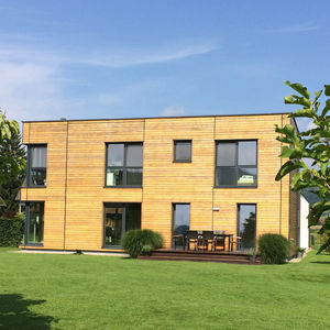 casa individual / moderna / con armazón de madera / con terraza