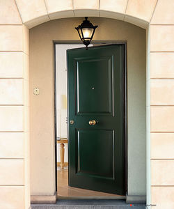 puerta de entrada / abatible / de MDF / de acero