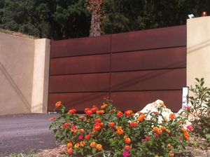 portones abatibles / de aluminio / de panel / para uso residencial