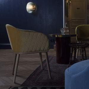 sillón moderno / de haya / de tejido / de cuero