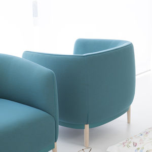 sillón moderno / de haya / de tejido / de cuero