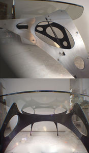 mesa de diseño original / de vidrio / de metal / ovalada