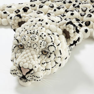 alfombra de diseño original / con motivos / de lana merino / anudada a mano