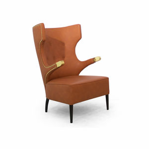 sillón moderno / de cuero artificial / con orejas / con respaldo alto