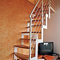 escalera recta / con zancas laterales / original peldaños de madera / de caracol estructura metálica - MARINARA GOMERA
