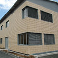 revestimiento de fachada de madera y terracota - ALPHATON® PATINATED