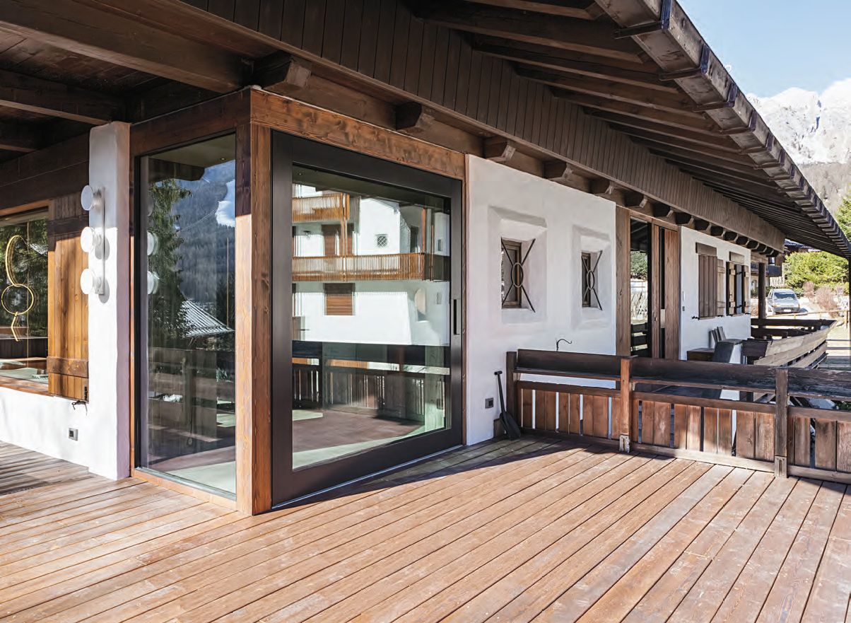 Puerta de entrada / empotrada / pivotante con eje descentrado / con