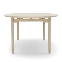 Mesa contemporánea / de madera / redonda...