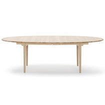 Mesa contemporánea / de madera / ovalada...