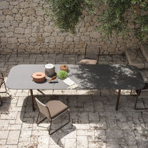 Mesa de comedor contemporánea / de acero...